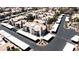 Aerial view showcasing well-maintained apartment buildings, covered parking, and landscaped grounds in a residential neighborhood at 8600 W Charleston Blvd # 2068, Las Vegas, NV 89117