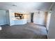 Bright, open floorplan integrating living, dining, and kitchen areas with neutral tones at 8600 W Charleston Blvd # 2068, Las Vegas, NV 89117