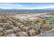 High-angle shot of homes near sporting facilities, with picturesque mountains in the background at 8737 Red Brook Dr # 201, Las Vegas, NV 89128