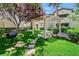 Lush backyard with a covered picnic area and barbecue, perfect for outdoor gatherings at 8737 Red Brook Dr # 201, Las Vegas, NV 89128