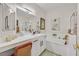 Bright bathroom features a large mirror, a tub, and a separate shower at 8737 Red Brook Dr # 201, Las Vegas, NV 89128