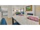Dining area with elegant table and seating, open to the living room at 8737 Red Brook Dr # 201, Las Vegas, NV 89128