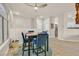 Bright dining area with a modern table set and contemporary lighting at 8737 Red Brook Dr # 201, Las Vegas, NV 89128