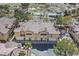 Exterior shot of a well-maintained home with a tile roof and meticulously landscaped grounds at 8737 Red Brook Dr # 201, Las Vegas, NV 89128