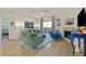 Bright living room with wood floors, fireplace, and contemporary furnishings at 8737 Red Brook Dr # 201, Las Vegas, NV 89128