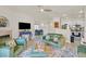 Cozy living room featuring modern decor, fireplace, and open concept to the kitchen at 8737 Red Brook Dr # 201, Las Vegas, NV 89128