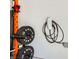 Garage features a gym setup and a Tesla charger at 8934 Libertyvale Dr, Las Vegas, NV 89123