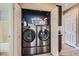 Convenient in-unit laundry closet featuring a washer and dryer at 8934 Libertyvale Dr, Las Vegas, NV 89123