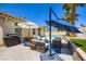 Covered patio area, perfect for entertaining guests and enjoying the outdoors at 8934 Libertyvale Dr, Las Vegas, NV 89123
