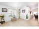 Bright dining area with tile flooring, chandelier lighting and a large window at 905 White Thunder St, Henderson, NV 89002