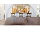 Bright kitchen with breakfast bar and seating, view from living room at 905 White Thunder St, Henderson, NV 89002