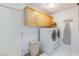 Convenient laundry room with storage cabinets and modern washer/dryer at 905 White Thunder St, Henderson, NV 89002