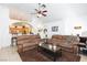 Spacious living room with two sofas and a view into the kitchen at 905 White Thunder St, Henderson, NV 89002