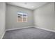 Neutral bedroom with carpet, window, and simple design at 9475 W Rosada Way, Las Vegas, NV 89149
