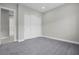 Neutral bedroom with carpet, a closet with sliding doors, and base moulding at 9475 W Rosada Way, Las Vegas, NV 89149