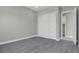 Spacious bedroom with closet and ensuite bathroom entrance at 9475 W Rosada Way, Las Vegas, NV 89149