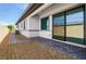 A patio featuring brick pavers, sliding glass door, and gray trim at 9475 W Rosada Way, Las Vegas, NV 89149