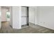 Bedroom featuring carpet and closet with sliding mirror doors at 9524 Quail Ridge Dr, Las Vegas, NV 89134