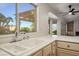 Kitchen sink overlooking backyard views and natural light, paired with ample counter space at 9524 Quail Ridge Dr, Las Vegas, NV 89134