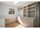 Bright office featuring a built-in desk, custom cabinetry, and natural light from the window at 9524 Quail Ridge Dr, Las Vegas, NV 89134