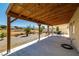Large covered patio with mountain views, perfect for enjoying the outdoors at 100 Eton St, Pahrump, NV 89048