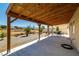 Large covered patio with mountain views, perfect for enjoying the outdoors at 100 Eton St, Pahrump, NV 89048
