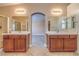Elegant bathroom featuring dual vanities with modern fixtures and plenty of counter space at 1044 Spanish Needle St, Henderson, NV 89002