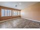 Inviting bedroom with large windows, tile floors, providing plenty of natural light at 1044 Spanish Needle St, Henderson, NV 89002