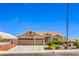 Beautiful single-story home with a three-car garage and well-maintained landscaping at 1044 Spanish Needle St, Henderson, NV 89002