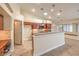 Spacious kitchen featuring stainless steel appliances, a breakfast bar, and ample counter space at 1044 Spanish Needle St, Henderson, NV 89002