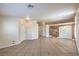 Spacious living room featuring tile flooring and an open layout at 1044 Spanish Needle St, Henderson, NV 89002