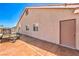Exterior shot of the side yard that shows a storage area along the side of the home at 1044 Spanish Needle St, Henderson, NV 89002