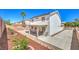 Large backyard features a covered patio and drought-tolerant plants at 1073 Nordyke Ave, Henderson, NV 89015