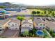 Aerial view of the home, yard, and neighborhood school, showing the convenience of the location at 10988 Salernes St, Las Vegas, NV 89141