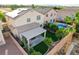 A manicured lawn, covered patio, sparkling pool and spa can be found in this home's perfectly sized backyard at 10988 Salernes St, Las Vegas, NV 89141