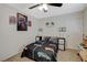 bedroom with a race car theme, checkered flags and ceiling fan at 10988 Salernes St, Las Vegas, NV 89141