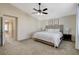 Bedroom with neutral paint, ceiling fan, and carpet at 10988 Salernes St, Las Vegas, NV 89141