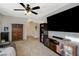 Upstairs living area with seating and entertainment features at 10988 Salernes St, Las Vegas, NV 89141
