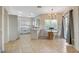 Charming dining area with modern lighting, access to the backyard, and a stylish table at 10988 Salernes St, Las Vegas, NV 89141