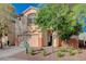 Delightful two-story home showcasing desert landscaping, a two-car garage, and a welcoming front entrance at 10988 Salernes St, Las Vegas, NV 89141