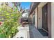 Inviting outdoor patio space with chairs, pavers, and floral accents at 110 Huckleberry Ln, Henderson, NV 89074