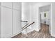 Upstairs hallway leading to bedroom with ample storage at 110 Huckleberry Ln, Henderson, NV 89074