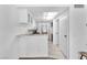 Efficient kitchen area with white cabinets and convenient layout at 110 Huckleberry Ln, Henderson, NV 89074