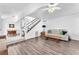 Spacious living room with stairs, wood flooring and natural light at 110 Huckleberry Ln, Henderson, NV 89074