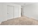 Bedroom featuring a carpeted floor and closet with sliding doors at 12112 Polar White Ct # 3, Las Vegas, NV 89183