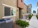 Attractive townhouse exterior with low maintenance yard, contemporary color scheme and sidewalk access at 12112 Polar White Ct # 3, Las Vegas, NV 89183