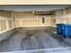 Spacious two car garage featuring concrete flooring, ample lighting, and storage shelving at 12112 Polar White Ct # 3, Las Vegas, NV 89183