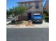 Charming two-story home with a well-manicured front yard and a parked SUV at 123 Gilliflower Ave, Las Vegas, NV 89183