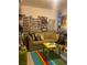 Eclectic living room with colorful decor and a cozy sofa, perfect for relaxing at 123 Gilliflower Ave, Las Vegas, NV 89183