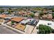 Aerial view of a home with solar panels, landscaping, and driveways, highlighting its features and location at 1816 Silver Birch Ln, Las Vegas, NV 89104